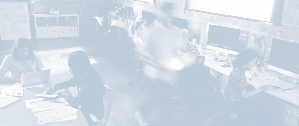 Elevated View Of Workers In Busy Modern Design Office