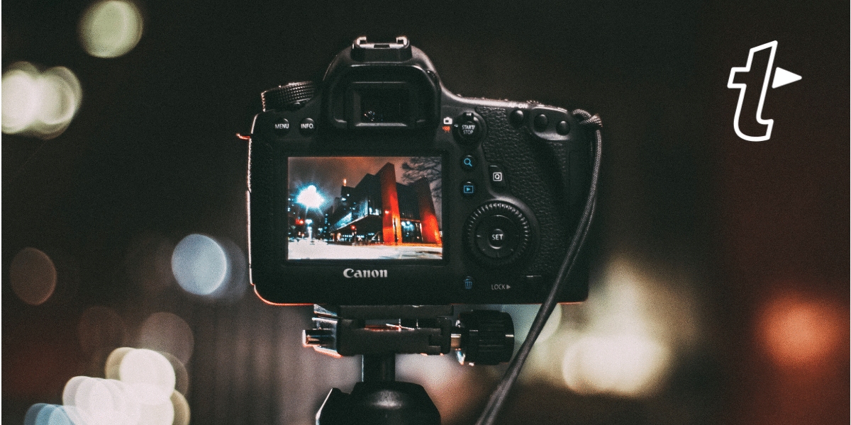 DSLR camera taking photo of a city