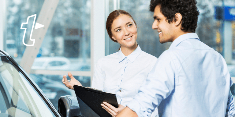 car salesperson chatting to customer