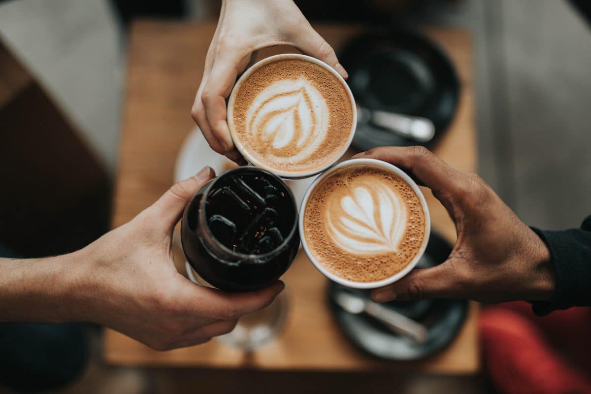 overhead shot of three cups of coffee