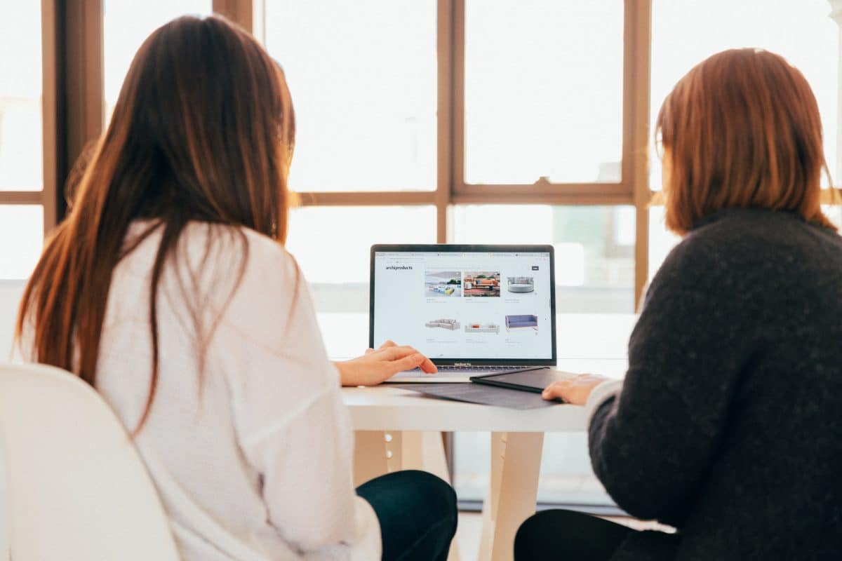 two women at a computer