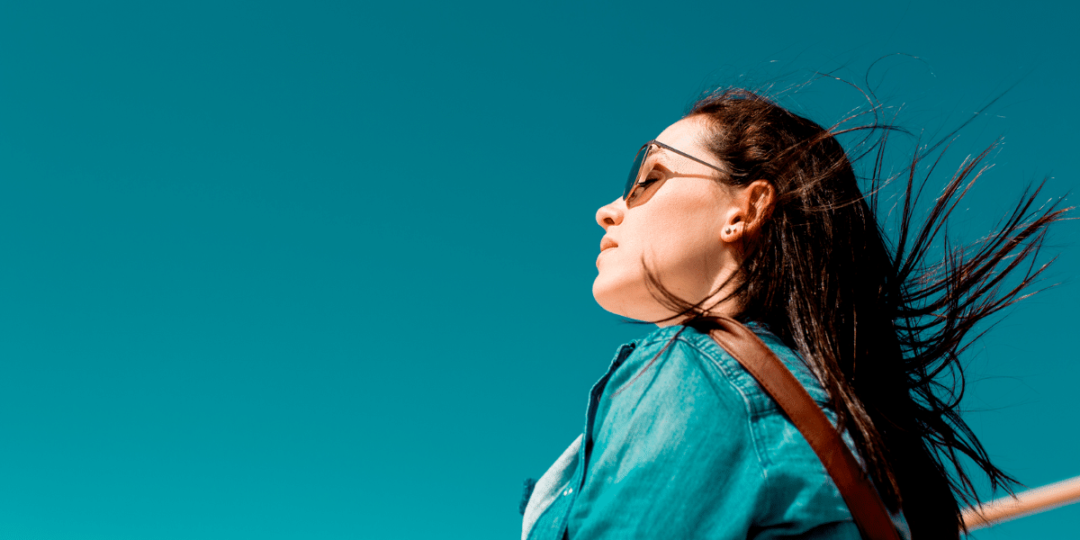 woman against blue sky