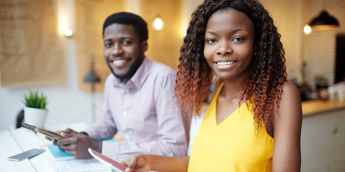 two young people smiling