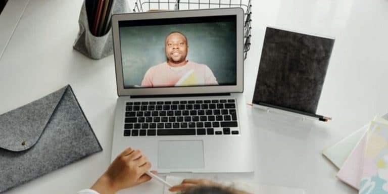 recruiter interviews male candidate on video with recruitment technology
