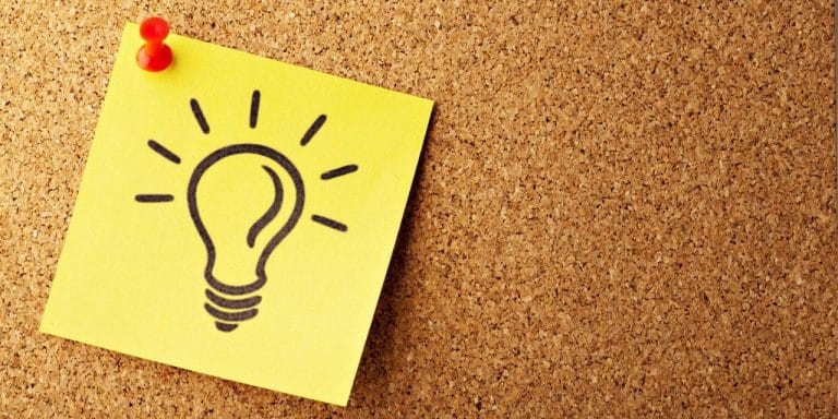 Post-it note with light bulb drawn on it, representing a recruitment idea