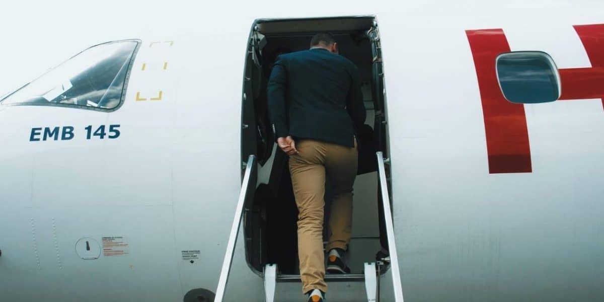 boarding a plane representing the onboarding remote employee into the team