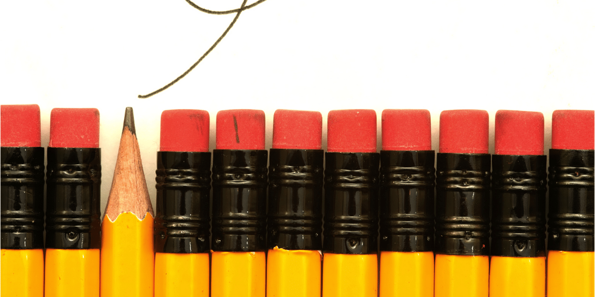 a row of pencils, one out of place