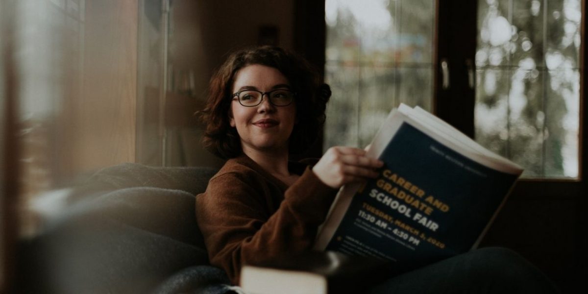 Candidate reading newspaper