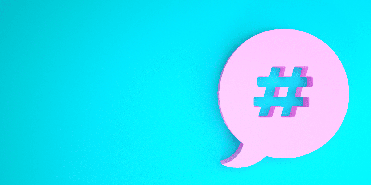 pink speech bubble with hashtag on blue background