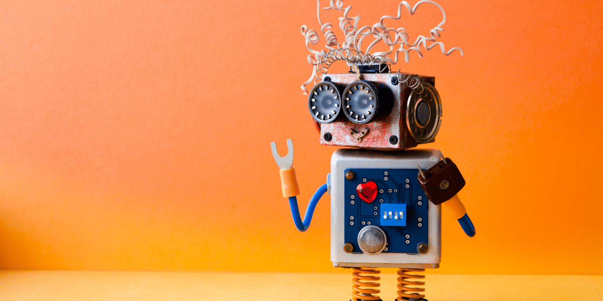 cute robot on orange background