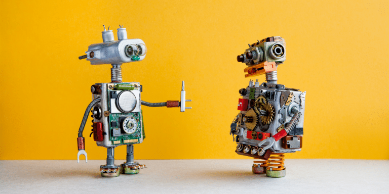a robot passing another robot a tool