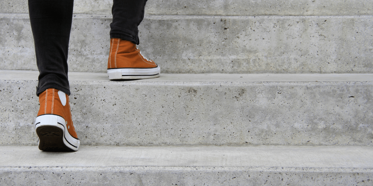 close up of shoes walking up steps