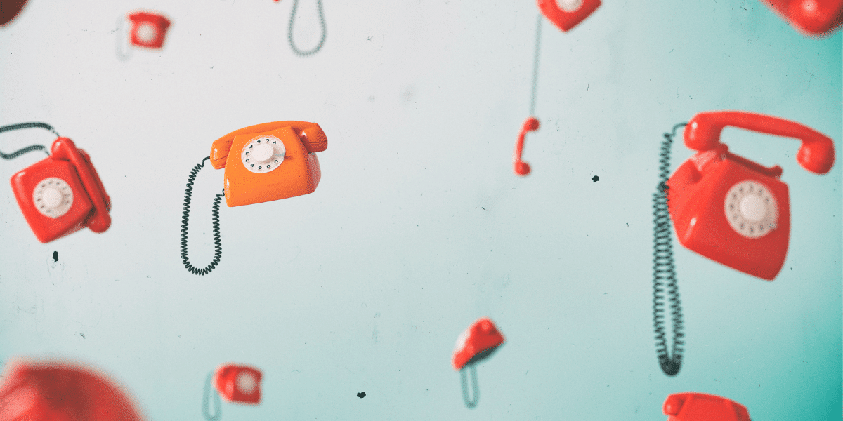 red telephones on a blue background