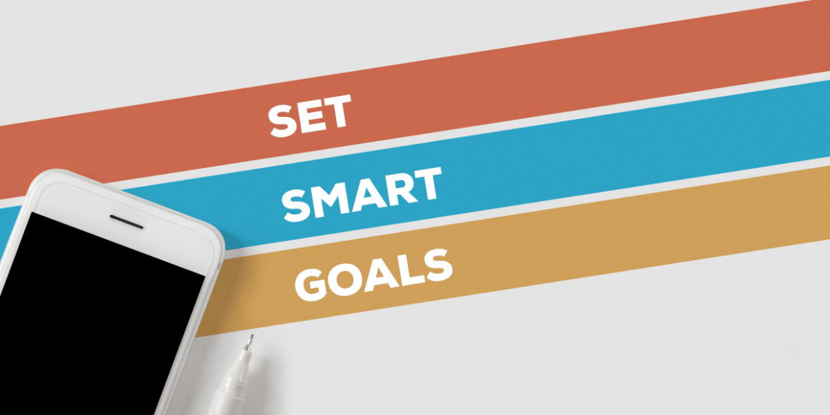 phone on white background that reads "set SMART goals"