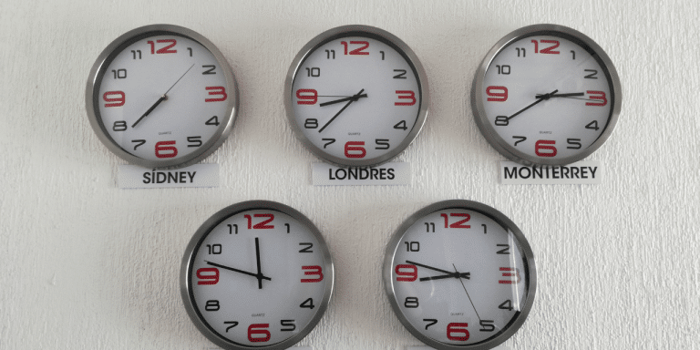Clocks on the wall show time in different cities