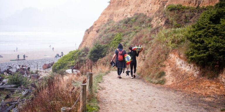 Asynchronous communication allows for better work-life balance, as shown in this picture of surfers