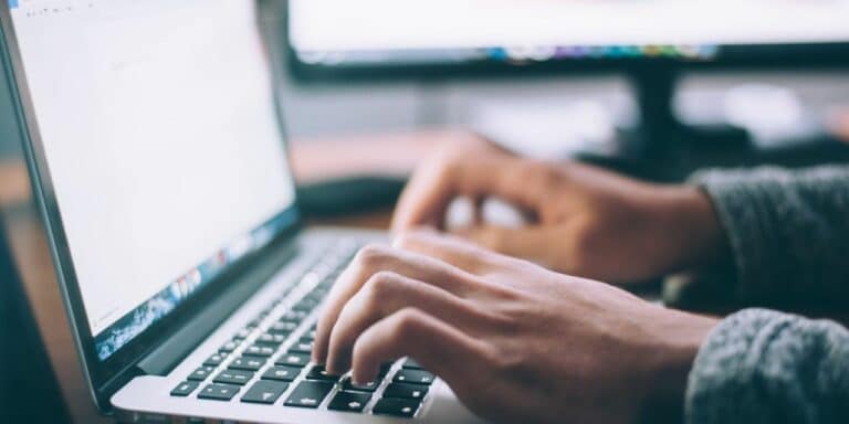 Person typing because they did not automate data entry