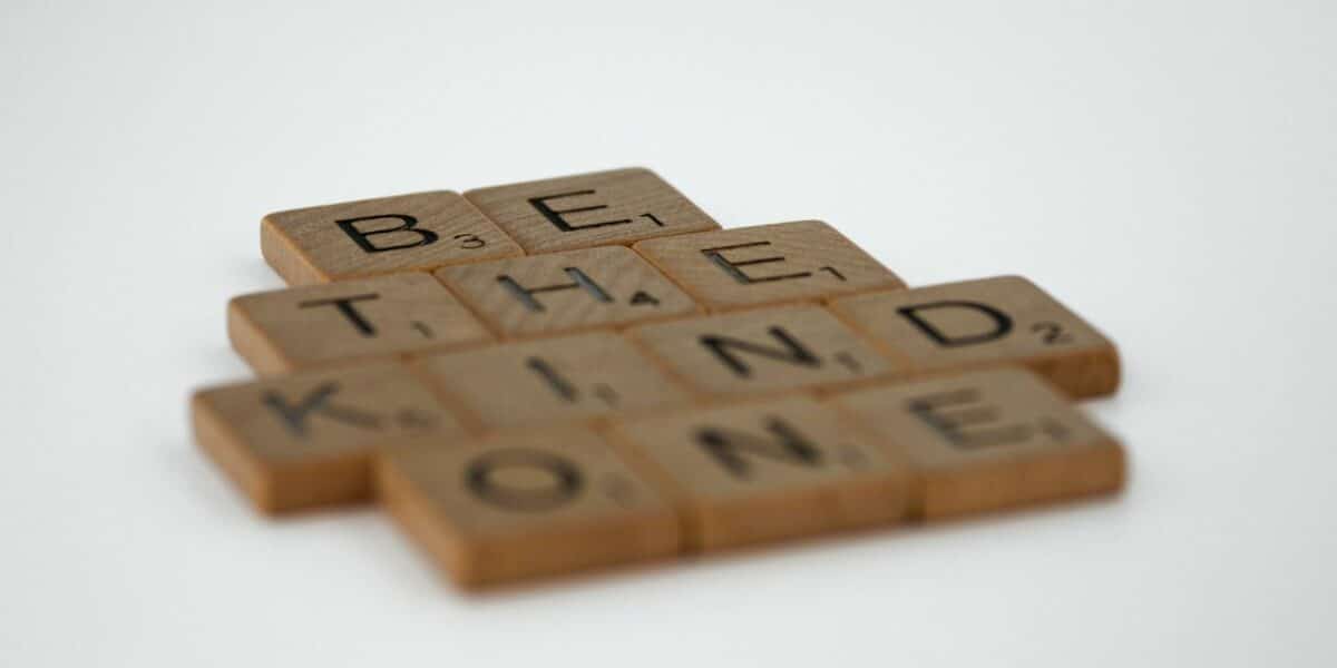 word puzzle spelling out "be the kind one"