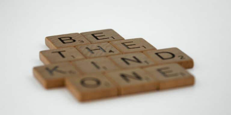 word puzzle spelling out "be the kind one"