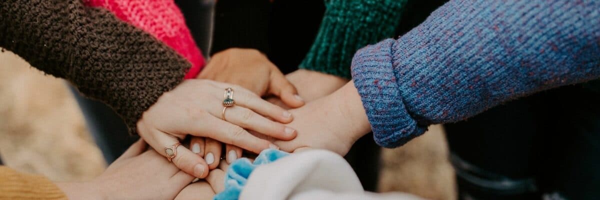Hands on top of hands