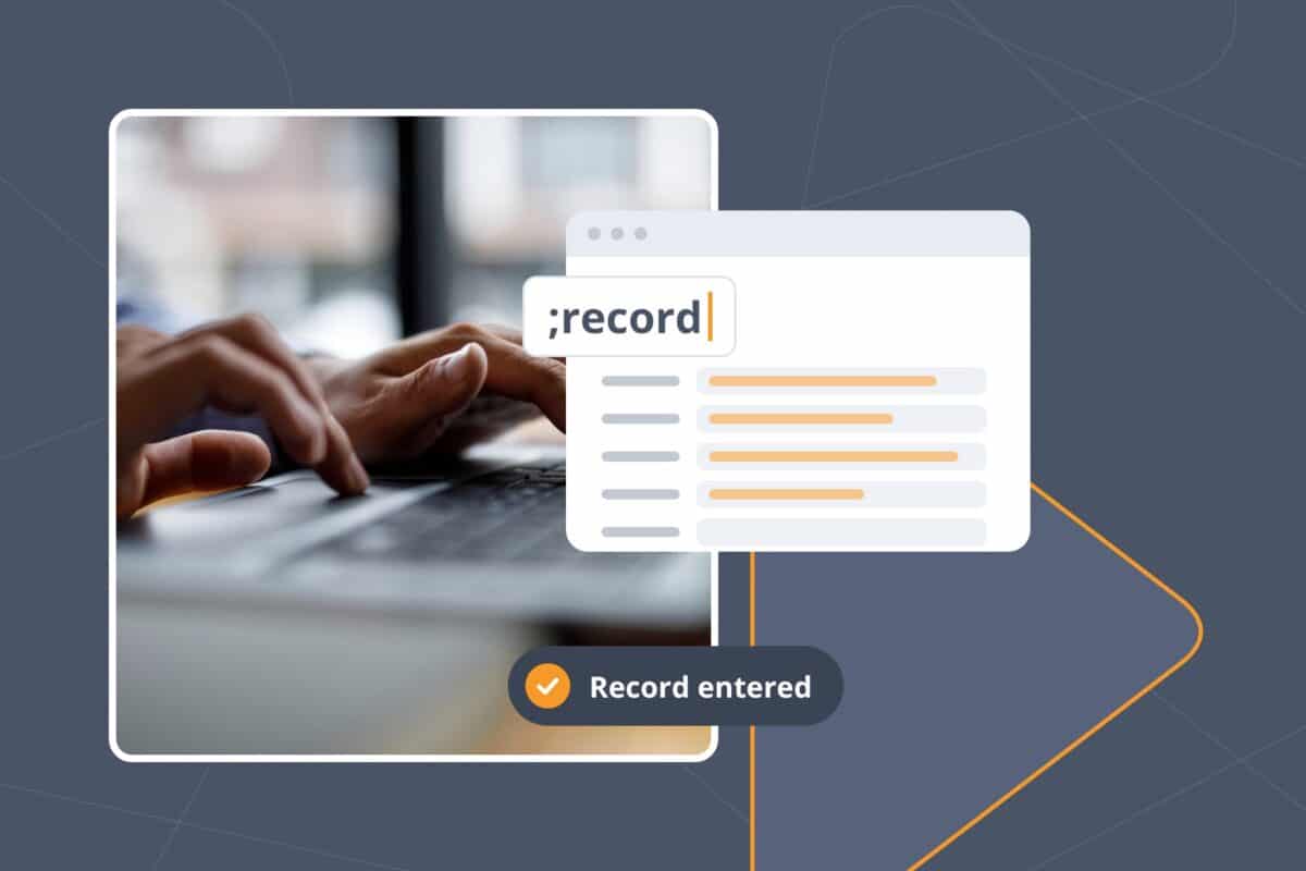 Person at a laptop typing the ;record Snippet, which fills a customer record form with standard details.