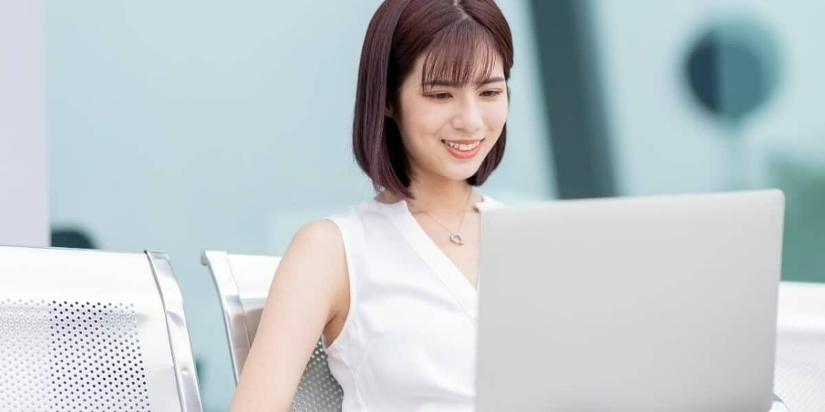 Woman with TextExpander and ClickUp for hybrid team work