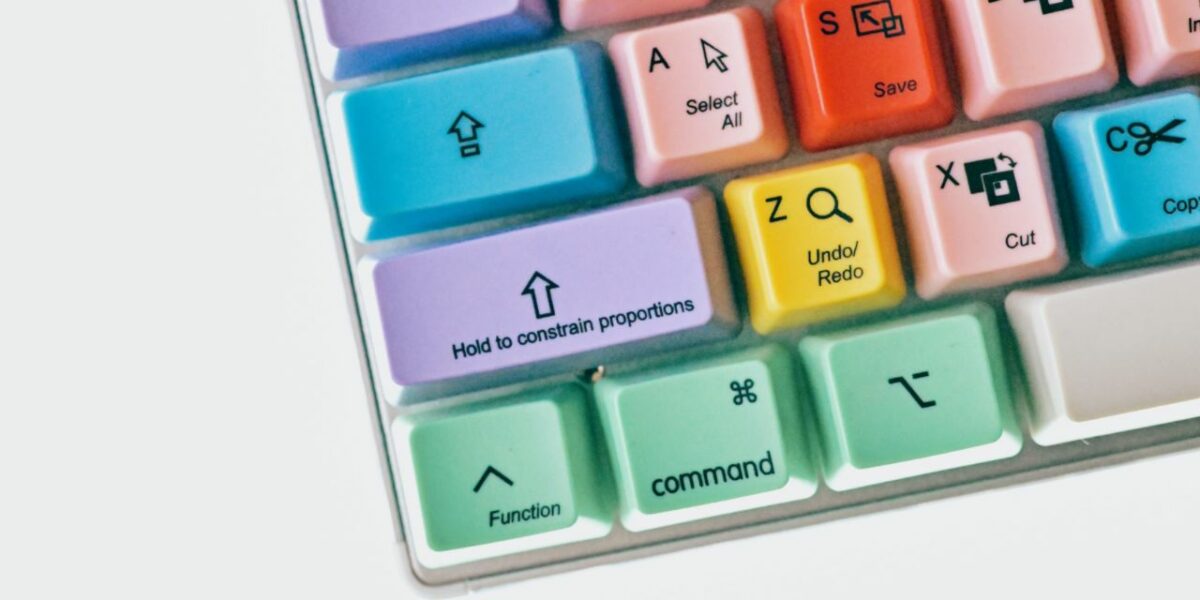 A close-up of a keyboard where all the keys are colourful and detailed