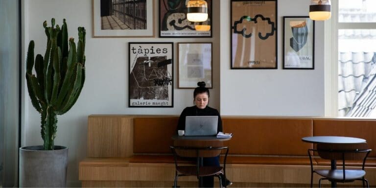 Woman sat working at laptop